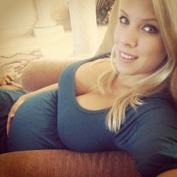 biggestboobguns:  Turns out you’d impregnated your girlfriend with quadruplets.  This is her at the beginning of her second trimester.  Having four babies in her made her hormones go crazy.  Her tits were growing bigger daily and she was always in