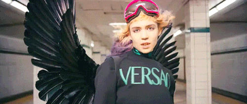 pitchfork:  Grimes’ new video for “Kill V. Maim” is an underground cyberpunk fantasy  