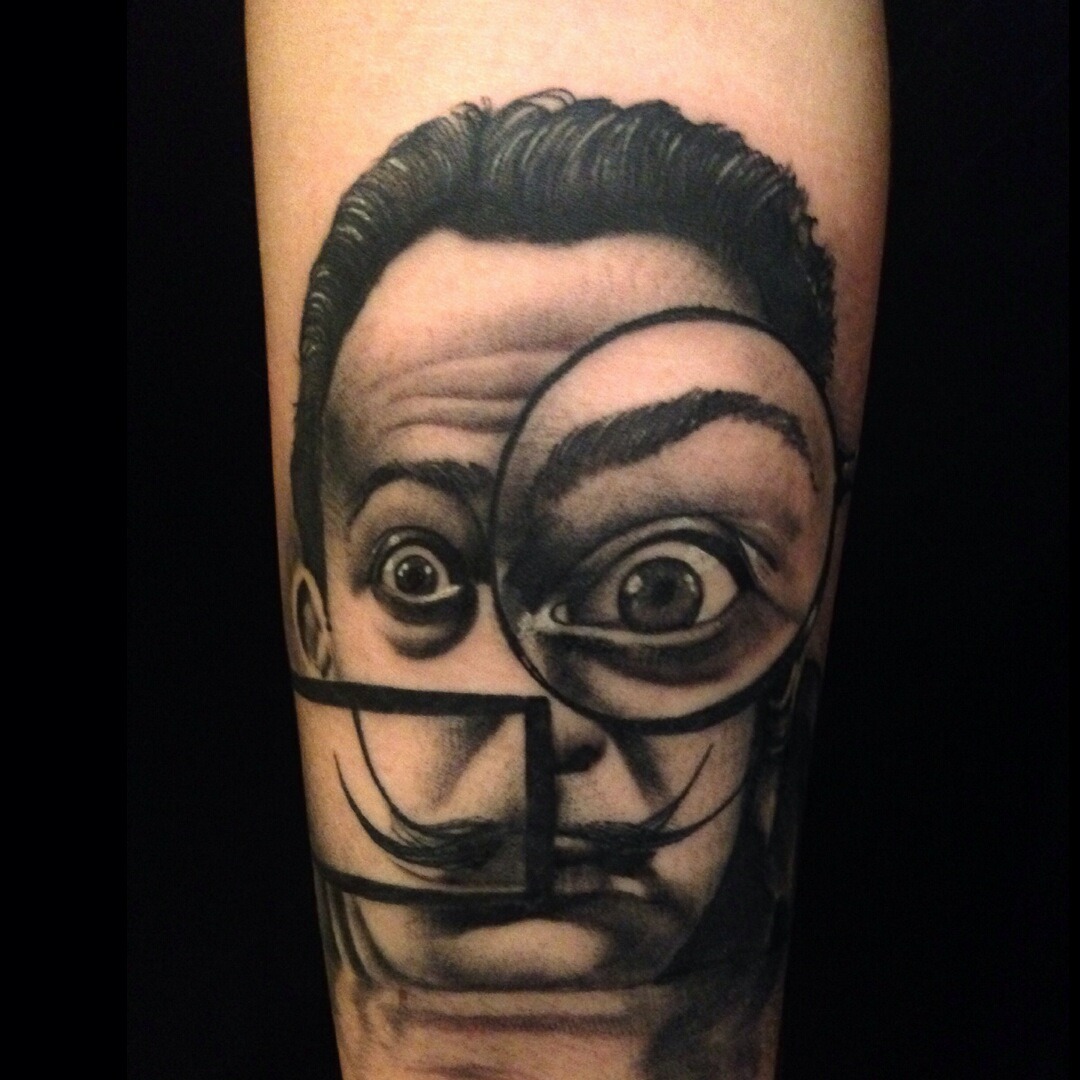 fuckyeahtattoos:  My girlfriends Salvador Dali portrait done beautifully by Tom Connors