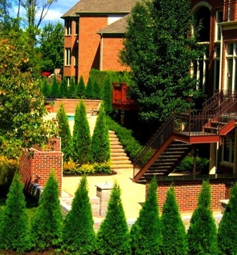 Landscape An Example Of A Large Full Sun Backyard Brick Retaining Wall Landscape.