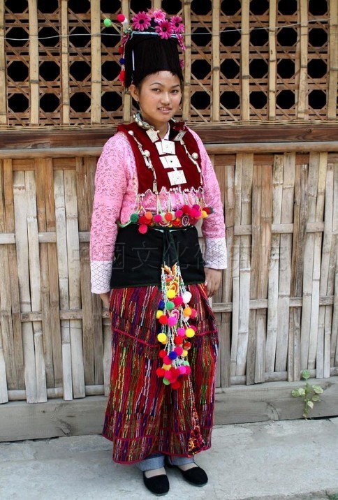 Chinese girl of the Achang ethnic minority in traditional dress