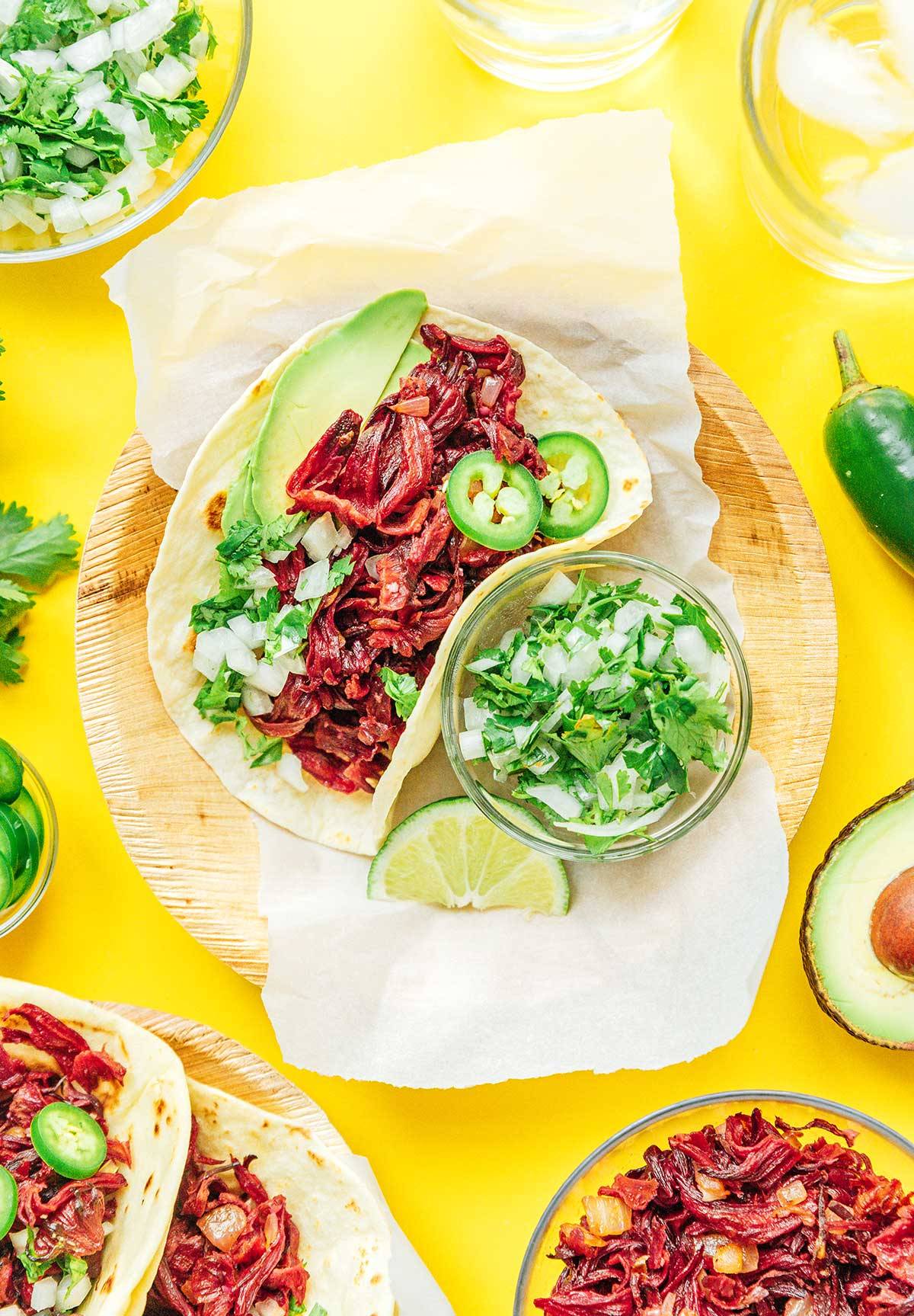 Vegan Hibiscus Tacos (Made With…Flowers?!) This Taco Tuesday, switch things up and try Hibisc Vegan Hibiscus Tacos (Made With…Flowers?!) This Taco Tuesday, switch things up and try Hibisc