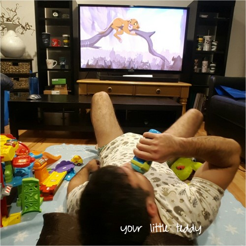 I gots to watch The Lion King. Onsie from @onesiesdownunder and little paws diapers..