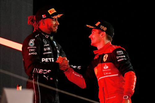 maranello:  BAHRAIN, 2022 — Lewis Hamilton, 3rd position, and Charles Leclerc, 1st position, o