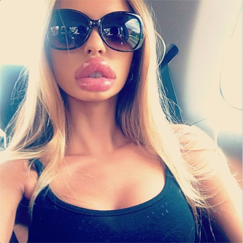bimbosupporter:  slutsbow2sir:  bimboz:  benfann1:  Now he’ll love you.  Yes. Full pussy lips.  This can’t be real! But fortunately I know it they are. Those are full on pussy lips that she now carries on her face daily. All to please a man.  Exactly.