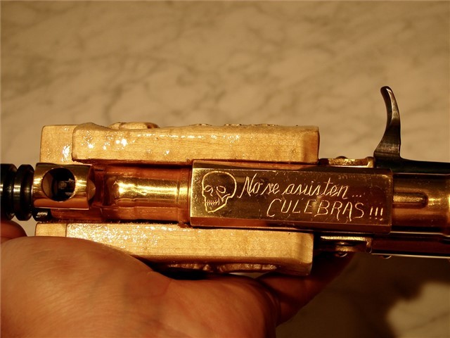 gunrunnerhell:  Bling?I think this started off as a Romanian Micro Draco Pistol but