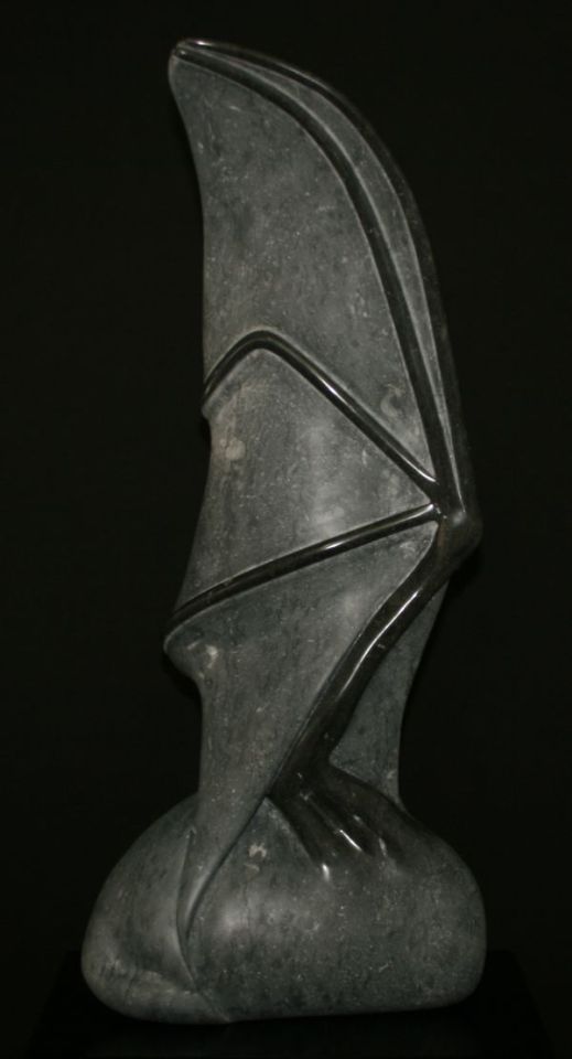 A sculpture titled Wing (Modern Abstract Carved Stone Bat sculpture) by sculptor Denis Yanashot. In a medium of Champlain Black Marble. #artist#sculpture#sculptor#art#fineart#Denis Yanashot#Marble#stone#limited edition