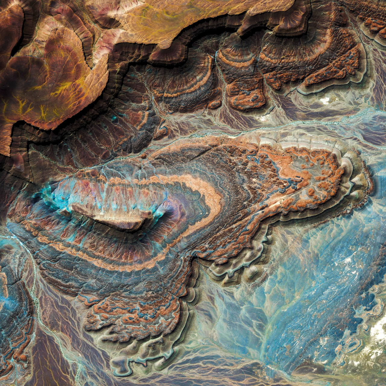 Amazing layered rock patterns are visible on the Adrar Plateau, near the town of Atar in northwestern Mauritania. Located within the Sahara Desert, the Adrar is an arid plateau known for its gorges, stony deserts and sand dunes. Cave and rock...