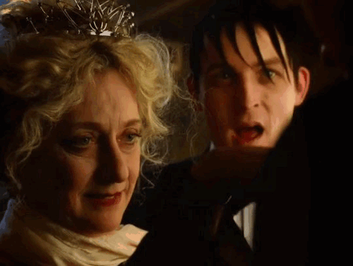 gertrud looks up at jim while oswald looks at jim with his mouth open, before saying 'mother-', directing her away from jim