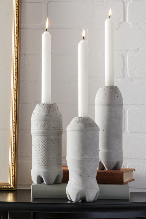 DIY Concrete Candlestick Tutorial from DIY Candy. This easy DIY uses plastic bottles and Quikrete (w