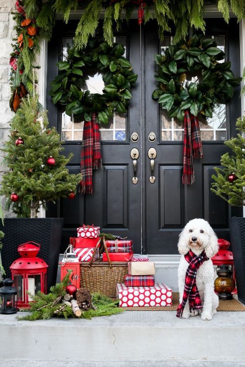 Pinterest , I LOVE these magnolia leaf wreaths with the plaid scarves used as ribbon. Adorable! 3a15