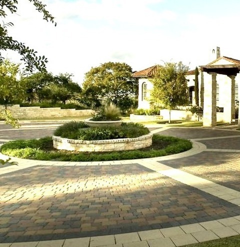 Design Ideas For A Large Mediterranean Partial Sun Front Yard Brick Driveway.