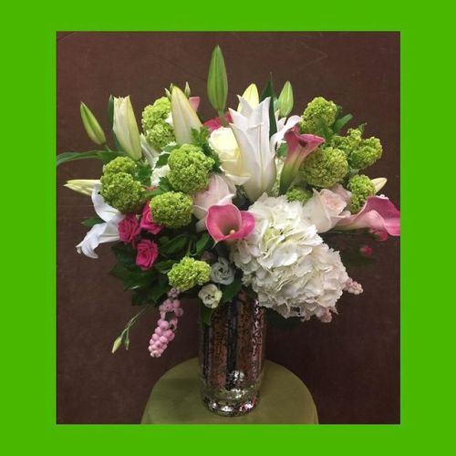 Green Viburnum, Pink Miniature Calla Lilies, White Oriental Lilies, Pink Snowberries And Mondial Roses