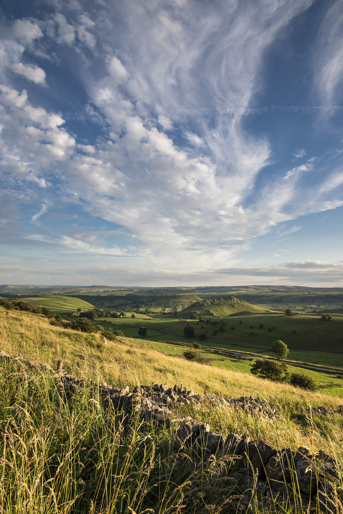 wanderthewood:  Wispy clouds above Parkhouse Hill - Peak District, England by Keartona
