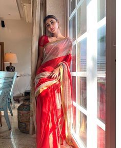 Mouni Roy wearing a Red Satin Saree With Sequins Panel Source: Mandira Bedi www.pintere