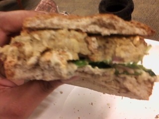 delicious eggplant burger I made today. sprouted grain bread, spinach, hummus, sauteed onions, and mozzarella daiya. 