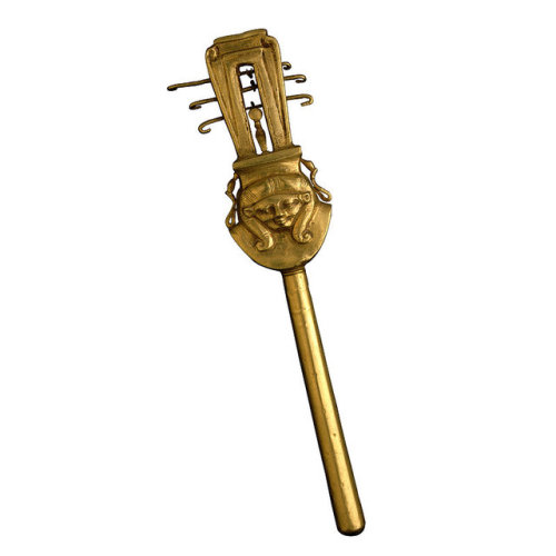 Gold Sistrum with Head of HathorThe sistrum or rattle was played to please the goddess Hathor. It is