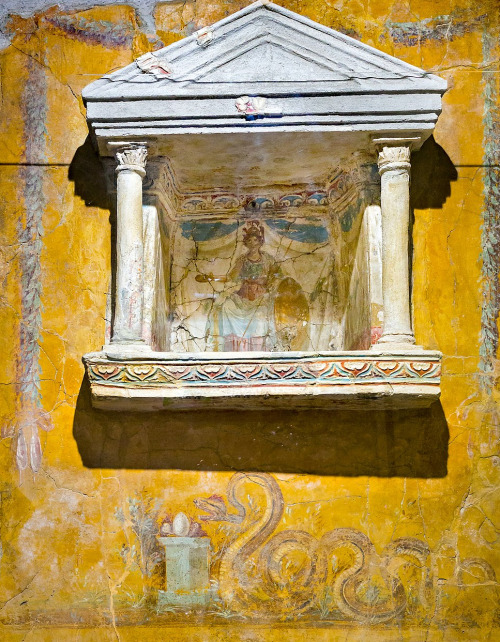 Lararium with wall painting; goddess Minerva sitting on throne, and Agathodaemon / Genius Loci snake