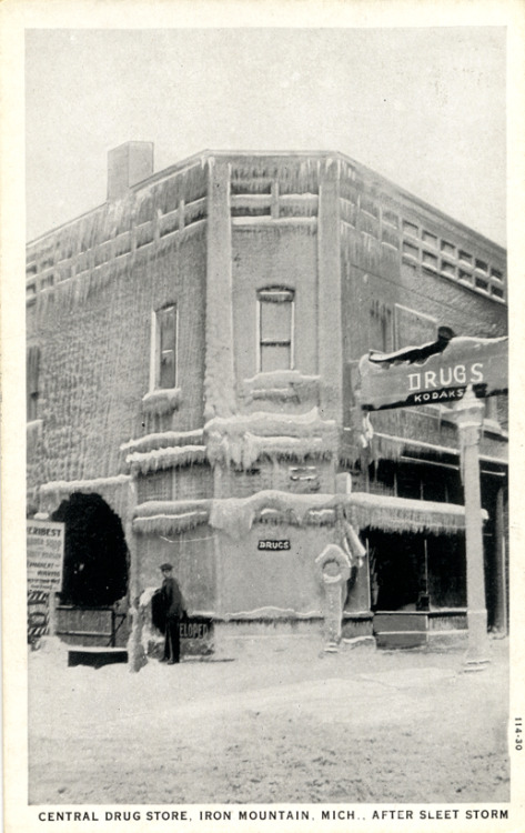 detroitlib: View of Central Drug Store covered in ice after a sleet storm in Iron Mountain, Michigan