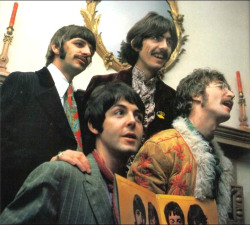 soundsof71:  The Beatles, posing with the Sgt. Pepper’s Lonely Hearts Club Band LP, May 1967