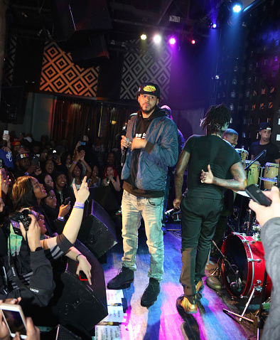 teamcole: J. Cole at Wale’s ‘The Surprise About Nothing’ Pop Up Show  Baby Jermaine.