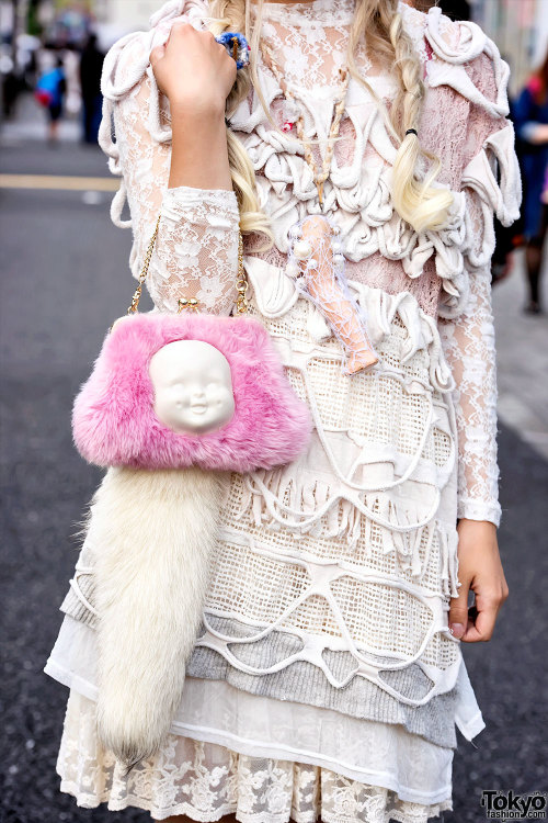 tokyo-fashion:  18-year-old Rarma on the street in Harajuku wearing a layered Nozomi Ishiguro dress with a handmade doll leg necklace, an AHCAHCUM.muchacha bag, and unicorn heels by Irregular Choice. Full Look