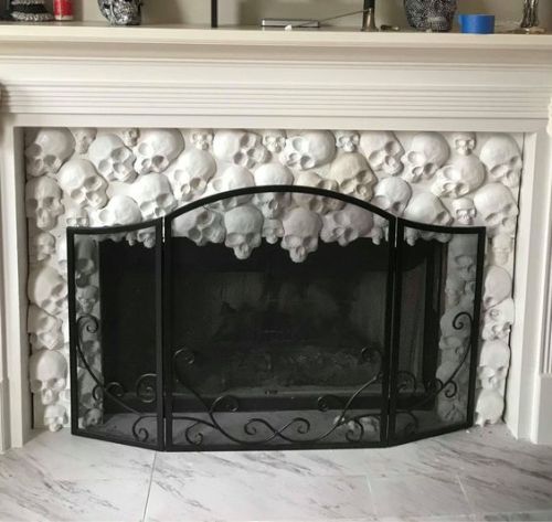 magicalandsomeweirdhometours:I no longer have a fireplace, but just came across this Skull Fireplace