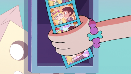 seddm:  The moment Star grabs the picture, her and Marco’s cheek begin glowing, and the the Blood Moon shines ominously in the sky. Literally, there’s a super ominous sound effect playing along with a reprise of the usual waltz.Mysterious. 