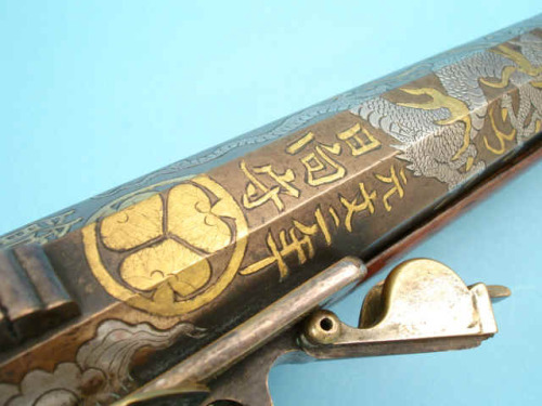 Ornate gold and silver decorated Japanese matchlock pistol, 18th century.