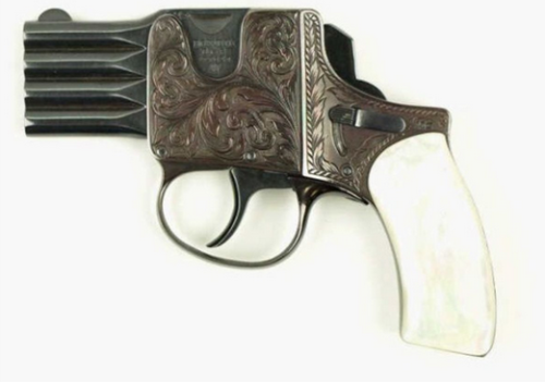 An engraved and pearl handled four barrel Reform pistol.  Originates from Germany, 1920’s.