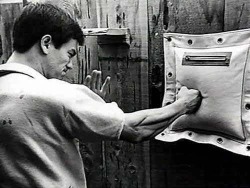 sifu-taichi-kungfu:    Bruce Lee - wing chun punch. I’ve done lots and lots of practicing on the rice bag. Love it!  