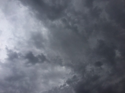 last monsoons of the season [image description: photo of the sky covered in storm clouds ranging fro