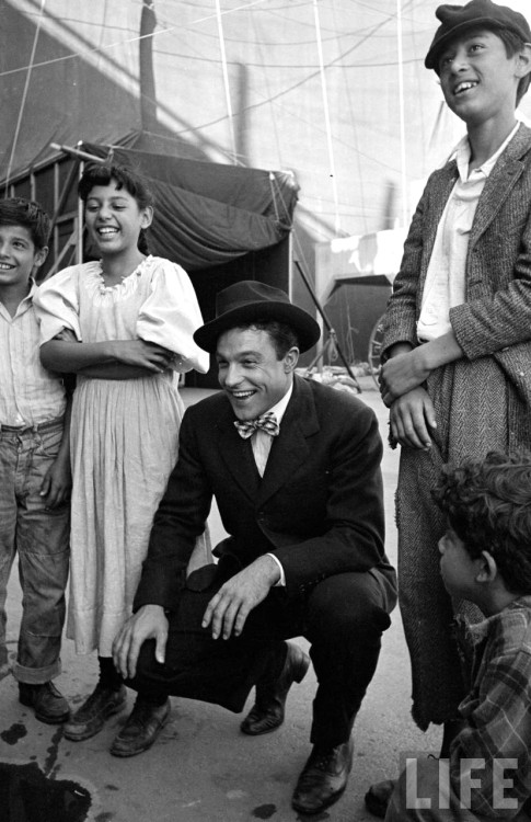 tea-courage-continue:  Gene Kelly entertains his co-stars on the set of ‘Black Hand’ (Ri