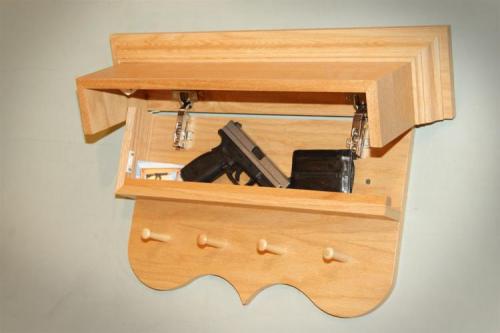 odditymall:  This gun concealment furniture has secret compartments to store your guns and is perfect for Dwight Schrute or Dale Gribble Rusty Shackleford. —->http://odditymall.com/gun-concealment-furniture 