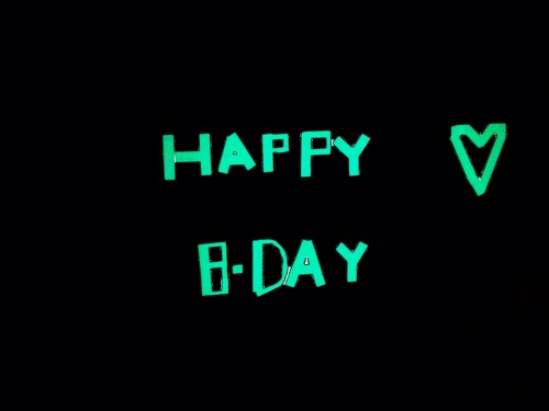 What the garage door looked like when Buffy got home from work (glow in the dark duct tape), her cake, what it looked like when she walked in the house with me singing happy birthday (yes, I was really singing) and her card that I couldn’t resist