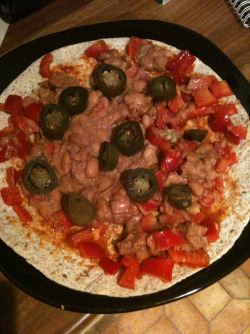 freespirithobo:  Grilled ReFried Pinto Beans Multi-Seed Tortilla! Grill a multi seed (or regular) Large Tortilla topped with Habanero hot sauce, Refried Pinto Beans, 1 diced Red Bell Pepper, Jalapenoes, and Grated Cheddar! Once the cheeese has melted