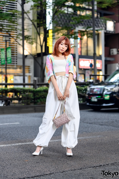 19-year-old Japanese model Uta on the street in Harajuku with an orange hairstyle, a cardigan over a