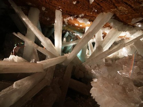 fuckyeahmineralogy:  The Cave of the Crystals is a cave underneath Chihuahua, Mexico that contains giant selenite (a polytype of gypsum, CaSO4·2 H2O). These huge crystals are able to form due to the high humidity and temperatures (over 100°F and near