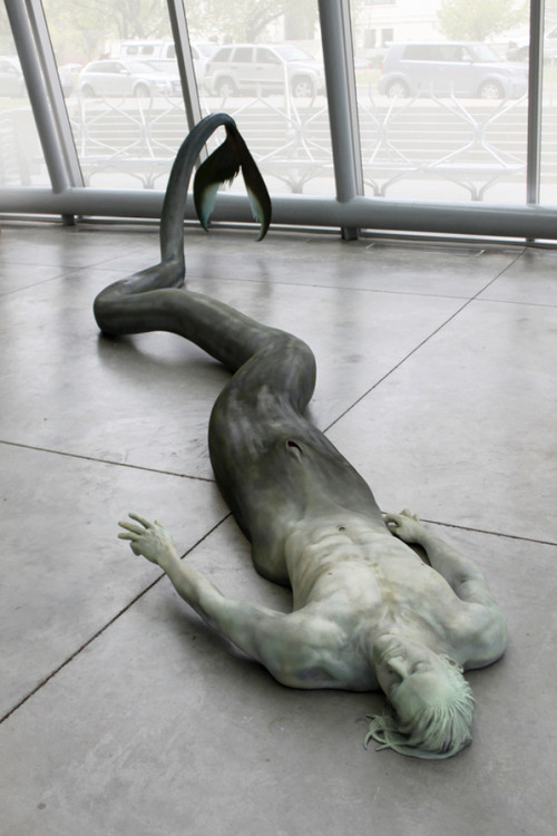 thescienceofjohnlock:  oh-so-shiny:  Amazing merman sculpture by artist Cameron Stalheim (photos are from his site and belong to him, not me).  Media is Plastic, Foam, Steel, & Acrylic.  If the merman looks familiar to you, it’s because the