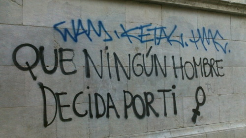 “No man decides for you”“My body my choice”“No means no! Stop aggressions”Feminist graffiti in Grana