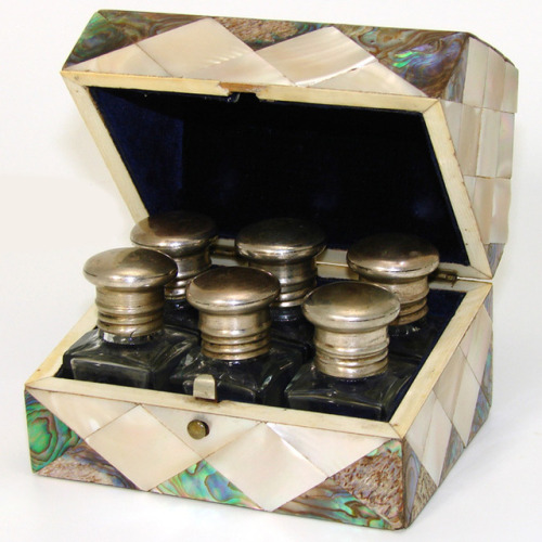 cair–paravel:  English  Victorian era perfume casket with six blown glass scent bottles.