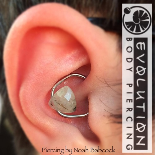 Fresh #daith piercing with jewelry by #evolutionmetalworks and a bit of custom bending. (at Evolutio