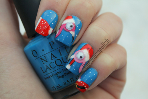 wickedklaws: nailsbycoewless:  Ugly flamingo sweater nails on Flickr. With rolling 3D eyes. I love h