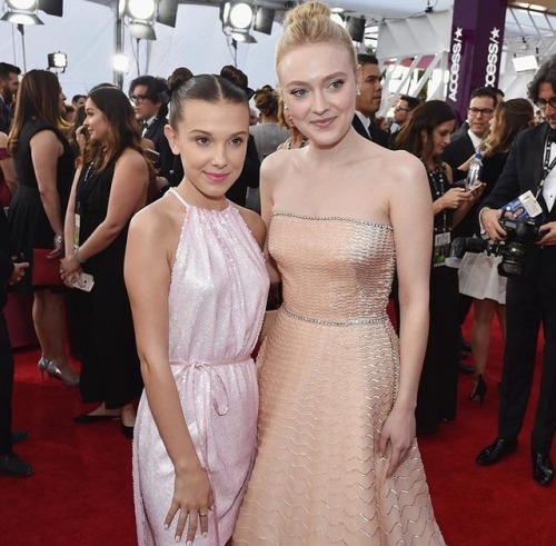 Millie Bobby Brown and Dakota Fanning attend The 24th Annual Screen Actors Guild Awards in Los Angel