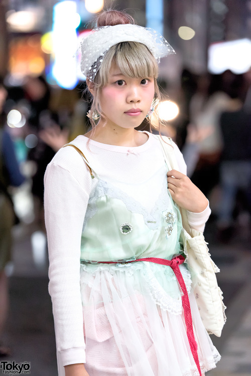 18-year-old Hikari on the street in Harajuku wearing a pastel cult party kei-inspired look featuring
