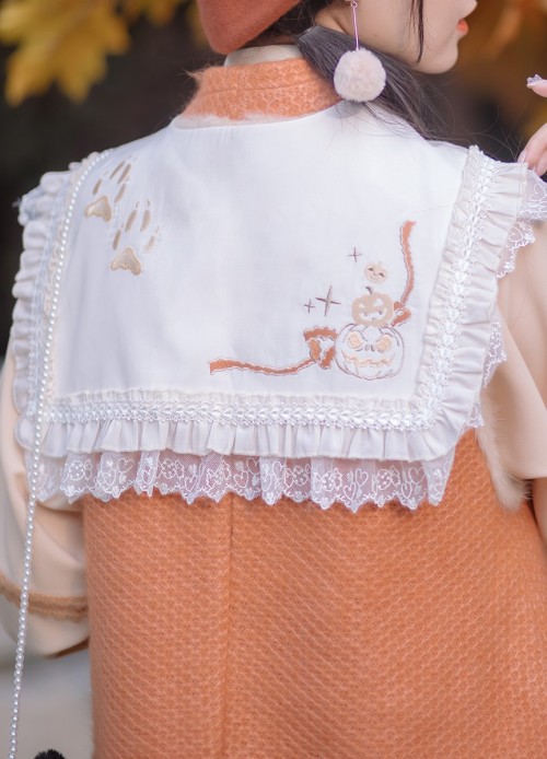 Sweet Halloween-themed hanfu outfit from Yuan Shan Qiao/远山乔. The model is wearing a light orange sha