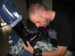 wp88:  A fag preparing a REAL MAN’s boots