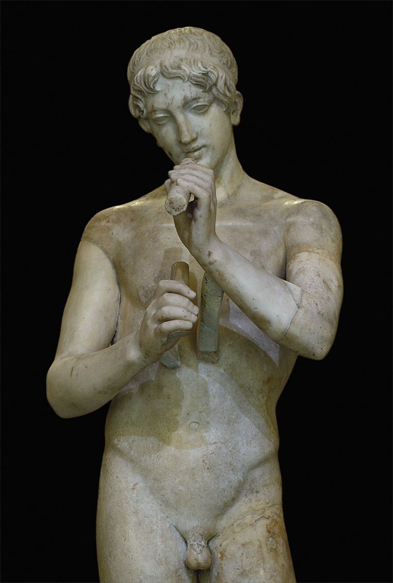 theancientwayoflife: ~Youth playing flute. Medium: Marble Roman copy after a Greek