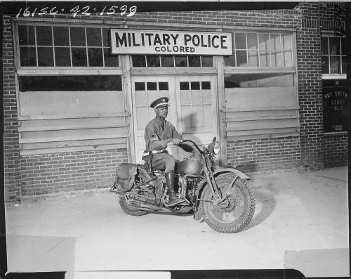 &ldquo;An MP on motorcycle stands ready to answer all calls around his area. Columbus, Georgia,” 4/1