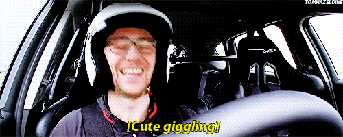tomhazeldine:  tom + giggling in a car 